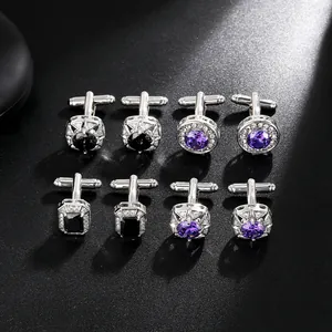 Polished metal cufflinks set with blue and purple stones for men's formal shirts