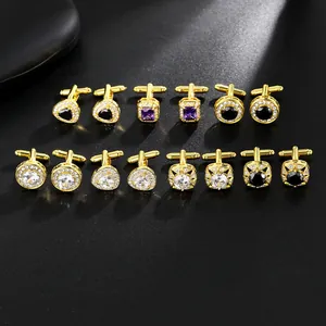 Detailed close-up of premium gold cufflinks collection featuring diverse gemstone settings