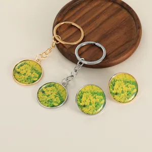 Retro rapeseed flower jewelry set including gold and silver necklaces and keychains