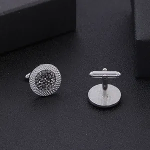 Boutons de manchette ronds en argent avec cristal noir et bordure texturée élégante