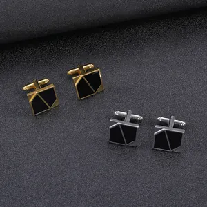 Set of gold and silver rectangle cufflinks with black geometric inlay for business shirts