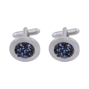 Boutons de manchette ronds en argent avec cristaux bleu foncé et bordure texturée