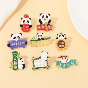 Macro view of panda enamel pins with gold edges and Chinese good luck characters