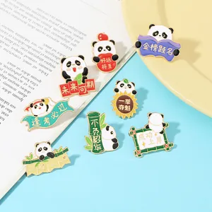 Detailed macro shot of creative panda enamel pins with motivational Chinese characters