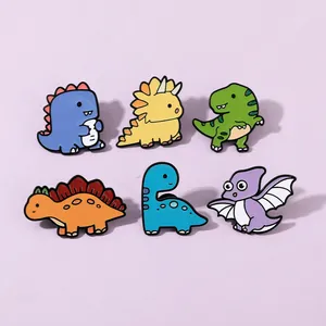 Detail view of a 6-piece colorful dinosaur enamel pin set featuring cute cartoon designs