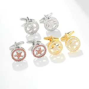 Macro detail of men's star cufflinks set with sparkling cubic zirconia in various colors