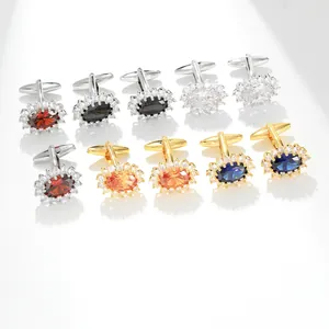 Macro shot of assorted luxury crystal cufflinks with halo setting and polished T-bar back