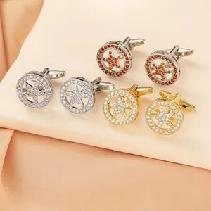 Macro view of crystal studded star shield cufflinks in gold and silver finish