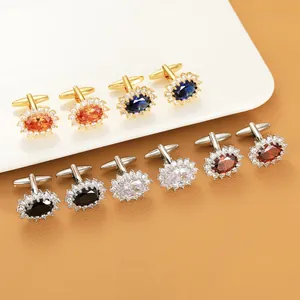 Close-up of luxury oval crystal cufflinks with diamond halo in multiple colors