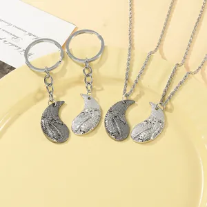 Retro dragon puzzle necklace and keychain set in vintage silver finish for couples