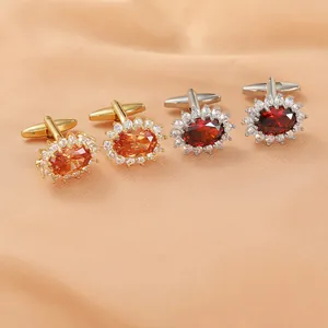 Detail of luxury oval crystal cufflinks with diamond halo in gold and silver finishes