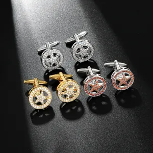 Detailed macro view of star-shaped cufflinks with micro-pave crystals in gold and silver