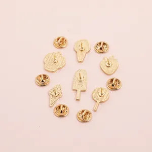 Golden alloy ice cream and strawberry enamel pins back view with butterfly clutch fasteners