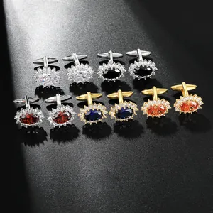 Macro detail of luxury crystal cufflinks in gold and silver with sparkling halo stones