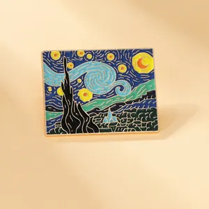 Macro view of rectangular Van Gogh Starry Night enamel pin with gold metal details