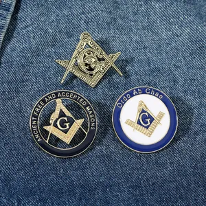 Detailed close-up of Masonic enamel lapel pins with intricate compass and square logos
