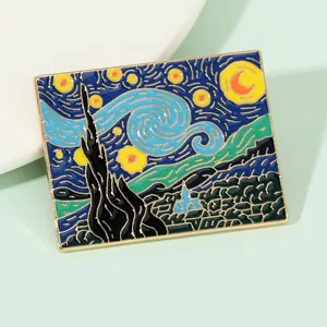 Macro shot of rectangular Starry Night enamel brooch with gold trim and artistic details