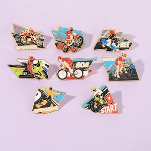 Close-up of eight enamel pins featuring motorcycle racing and extreme sports designs