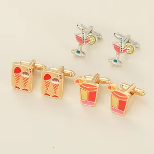 Detail view of creative enamel cufflinks featuring ice cream and cocktail drink designs