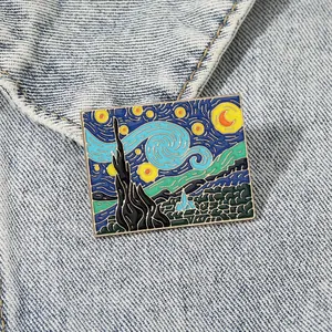Artistic Van Gogh Starry Night enamel pin badge on light blue denim jacket background