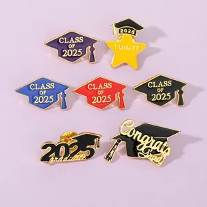 Detailed close-up of colorful 2025 graduation cap enamel pins with golden metal edges