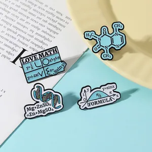 Detailed view of four science enamel pins featuring math formulas and chemical structures