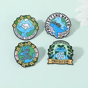 Lot de quatre broches en émail écolo avec thèmes de protection du climat et de la terre