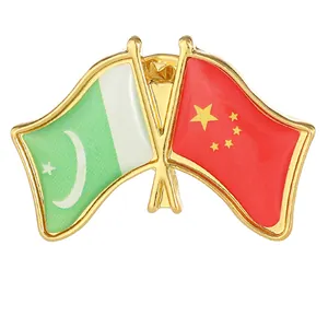 Broche croisée d'amitié drapeau Chine et Pakistan en émail plaqué or finie