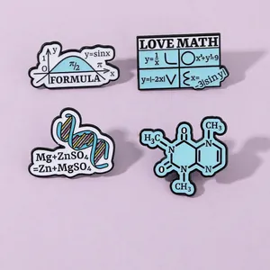 Macro view of blue enamel science pins featuring DNA, math formulas and caffeine structure