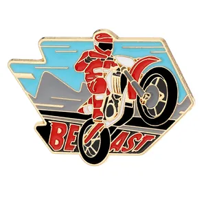 Enamel motorcycle pin with rider and BEAST text in gold plated zinc alloy finish