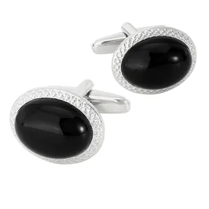 Gemelli da polso ovali in argento da uomo con cristallo nero e trama geometrica