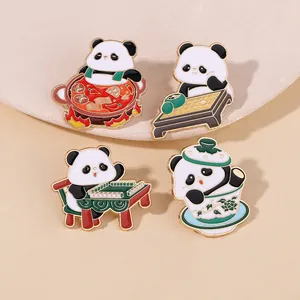 Detailed view of four enamel panda pins featuring hotpot, mahjong, tea, and chess themes