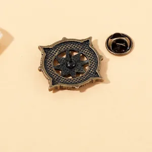 Vintage bronze star brooch with anchor helm nautical style for suits and coats