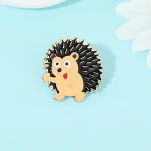 Close-up of cute cartoon hedgehog enamel pin with vivid details on a floral background