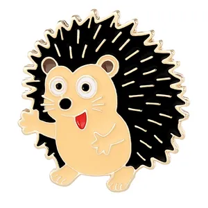 Cute cartoon hedgehog enamel pin in beige and black with gold plating for accessories
