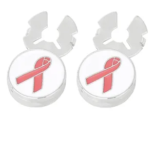 Men's silver cufflinks with pink ribbon awareness symbol on a white background
