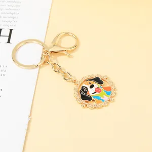 Fashionable cartoon dog keychain with colorful drip oil pendant on golden metal ring