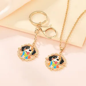 Cartoon dog enamel necklace and keychain set with gold lace border and colorful charm