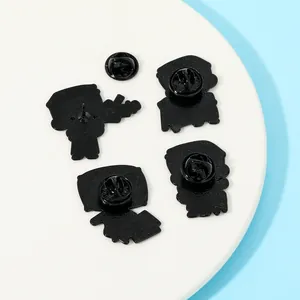 Set of four cartoon metal pins showing the back structure and black butterfly clutch