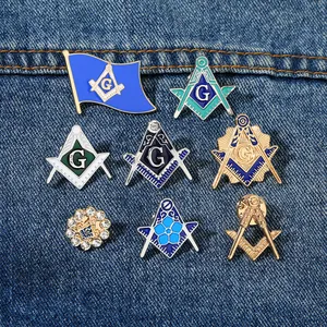 Set of eight Freemasonry enamel badges with compass and square on denim fabric