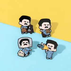 Detail of Lu Xun cartoon enamel pins featuring motivational themes and metal craftsmanship