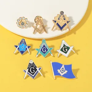 Macro shot of eight assorted Masonic compass and square enamel lapel pins on a display