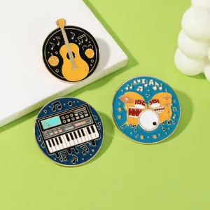 Detailed macro view of musical instrument enamel pins featuring guitar and drums