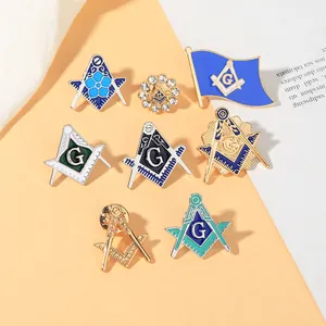 Detail view of Masonic Freemasonry enamel brooches with compass and square designs