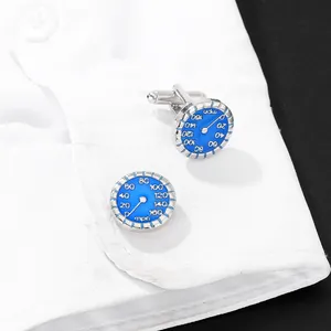 Classic silver speedometer cufflinks with blue dial and white MPH markings on shirt cuff