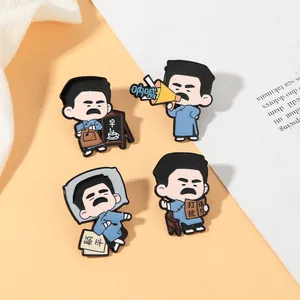 Detail showing four assorted Lu Xun cartoon enamel pins on a decorative background
