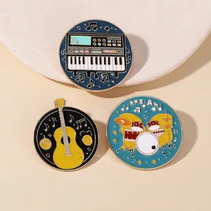 Detailed view of three enamel music pins featuring guitar, drums and keyboard motifs
