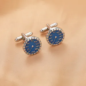 Detail of silver speedo cufflinks with blue enamel dial and mph markers on orange silk