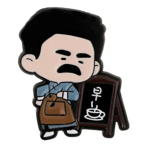 Cartoon enamel pin of a man in blue apron with a Japanese early sign and coffee icon