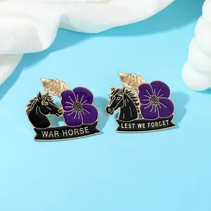 Detailed enamel brooches featuring purple poppies and war horse motifs on sky blue surface